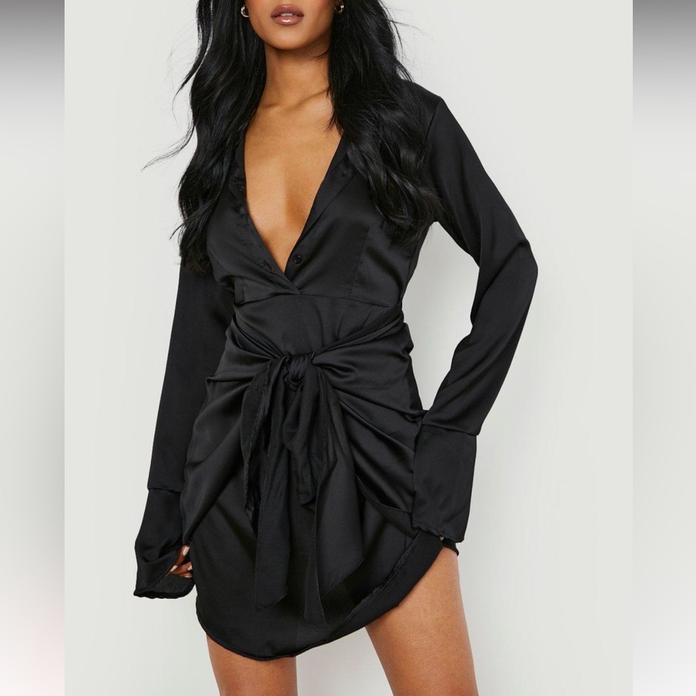 Brand new still in bag, black dress